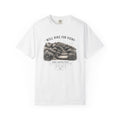 A white short-sleeve crewneck t-shirt featuring a black and white graphic print of a hiking trail on the front, with the text 'WILL HIKE FOR VIEWS' and 'WIND CANYON TRAIL'.