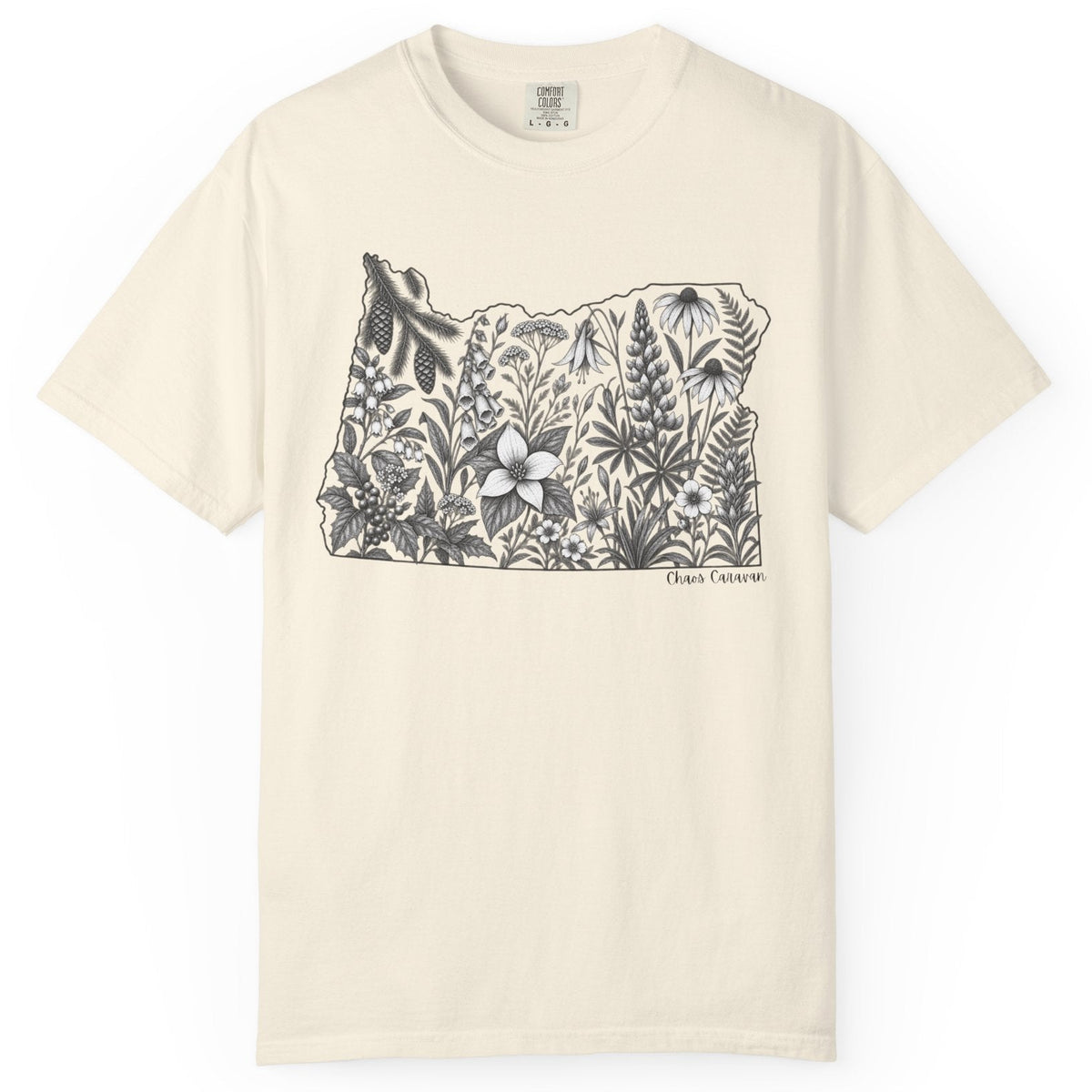An off-white short-sleeve crewneck t-shirt featuring a black and white graphic of the state of Oregon filled with detailed botanical illustrations. The brand 'Chaos Caravan' is printed in small text on the right side of the graphic.