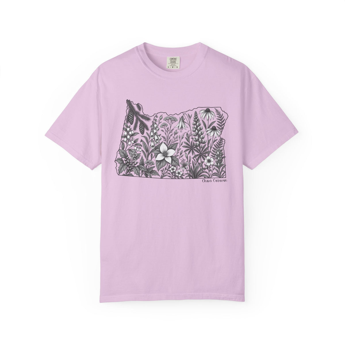 A light purple short-sleeve crewneck t-shirt featuring a black and white graphic of the state outline of Oregon filled with tropical foliage and flowers, displayed on a clean white background.