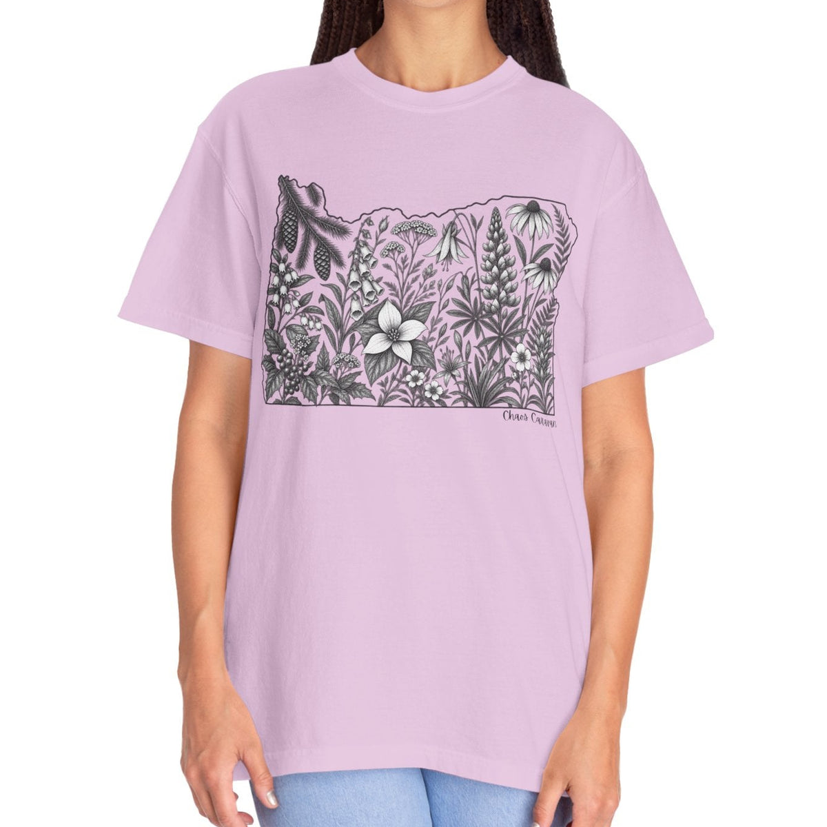 Woman wearing a lavender t-shirt with a state of Oregon design and text on a white background