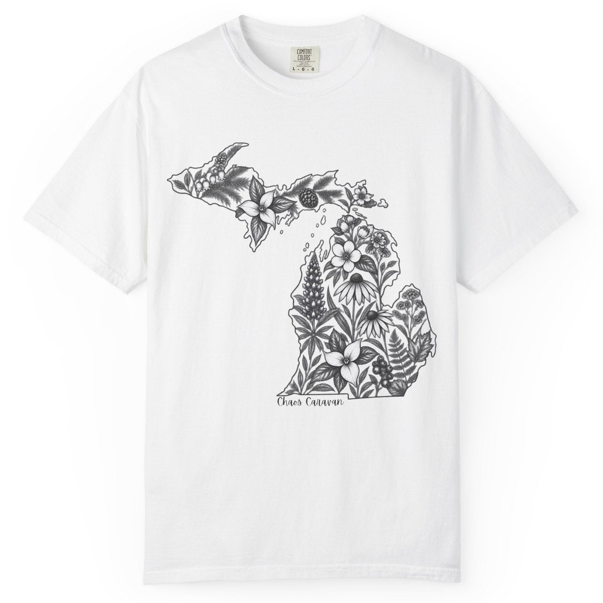 A white short-sleeve crewneck t-shirt featuring a black graphic of the state of Michigan filled with floral and botanical illustrations, with the text 'Chaos Caravan' printed below the map.