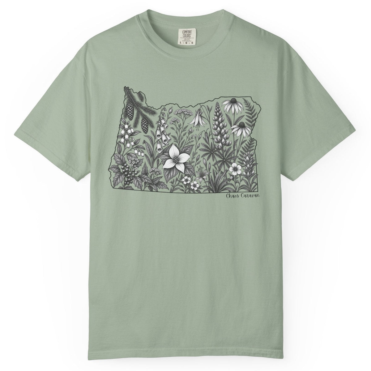 A sage green short-sleeve crewneck t-shirt featuring a black and white graphic of the state outline of Oregon filled with detailed wildflower illustrations, displayed on a clean white background.