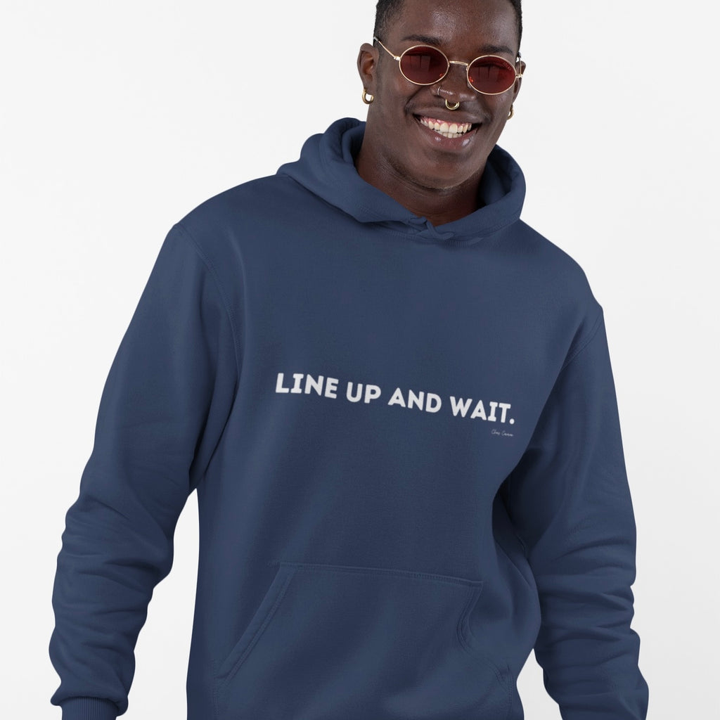 Person wearing a navy hoodie with 'LINE UP AND WAIT.' text in white words